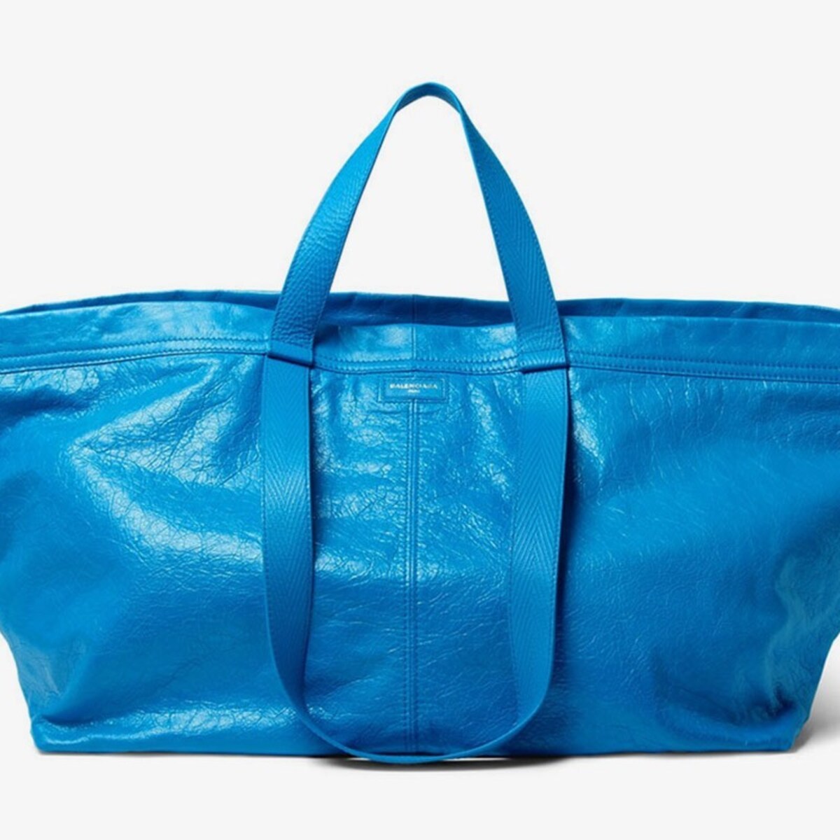 Een papieren zak van Raf Simons voor 630 euro merkengekte swingt de pan uit De Morgen