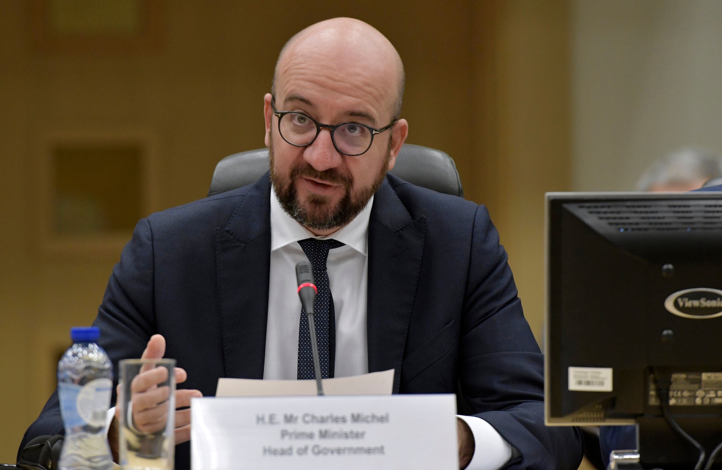 Premier Michel vraagt parlement zich uit te spreken over pact, Groen en sp.a steunen premier