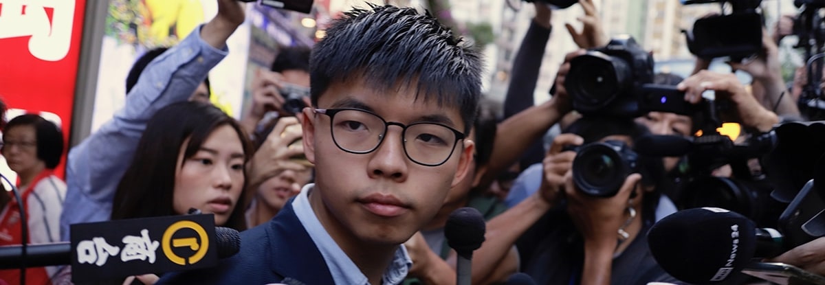 Joshua Wong (23) is een held in Hongkong: ‘We zullen doorgaan tot we de oorlog gewonnen hebben’