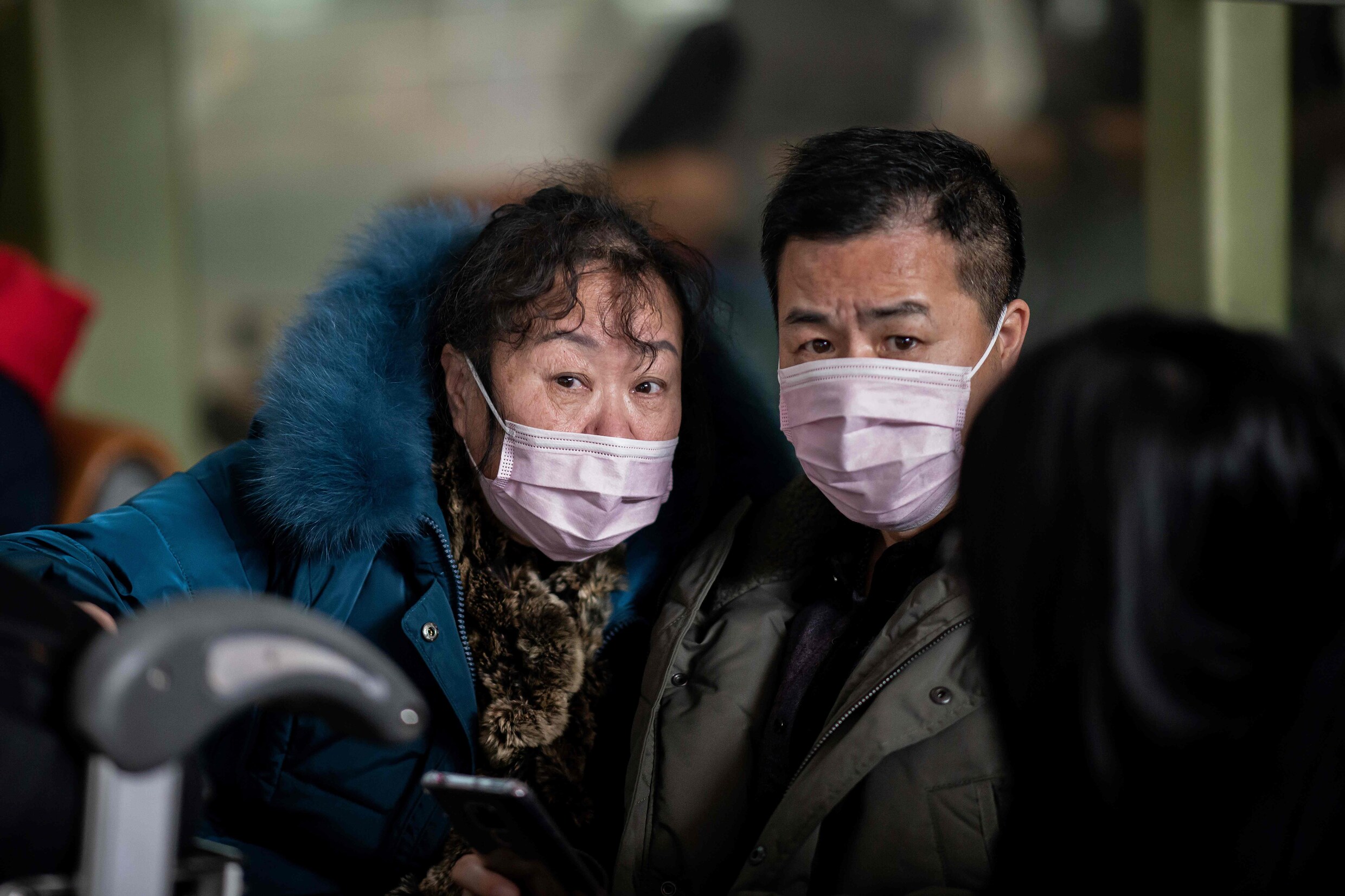 Coronavirus: Peking annuleert nieuwjaarsfeestelijkheden, al drie Chinese steden geïsoleerd