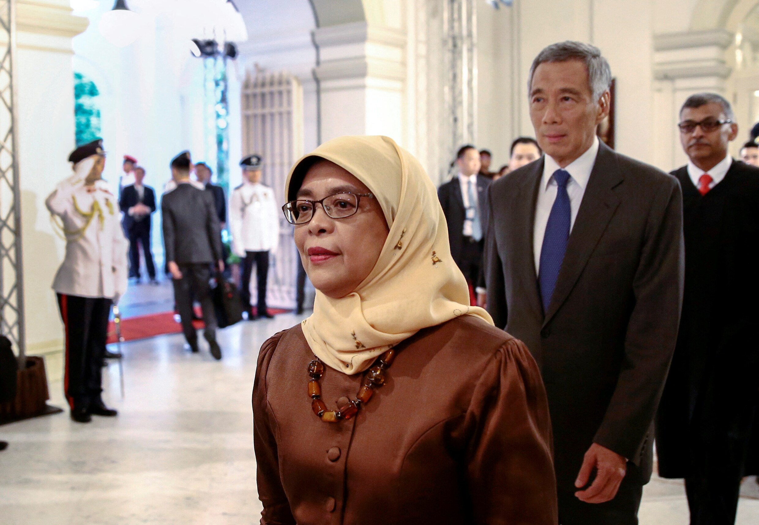 Morrende Singaporezen kiezen vrijdag nieuwe president | De Morgen
