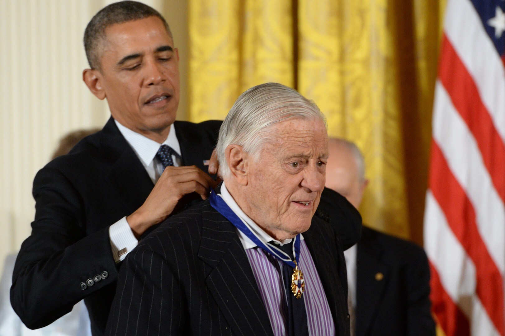 Ben Bradlee (R), former editor of the Washington Post, is awarded the Presidential Medal of Freedom by US President Barack Obama (L), in the East Room of the White House in Washington DC, USA, 20 November 2013.