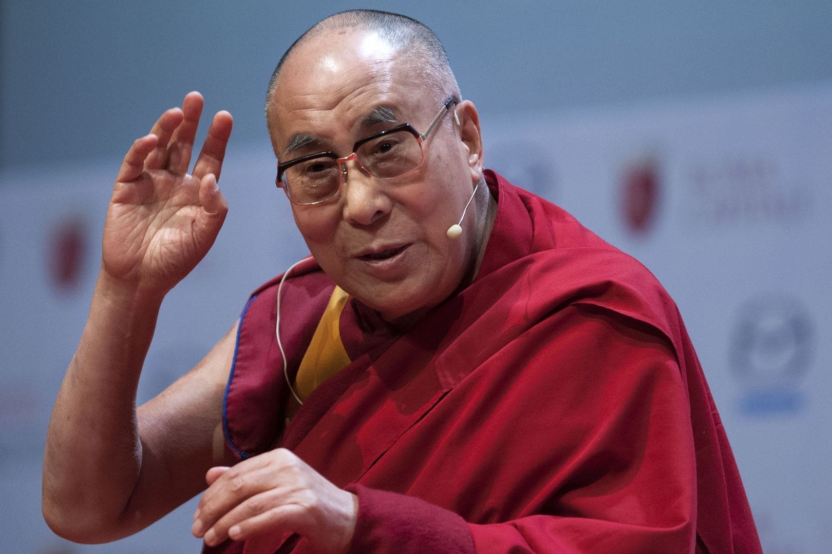 Dalai lama op affiche Glastonbury | De Morgen
